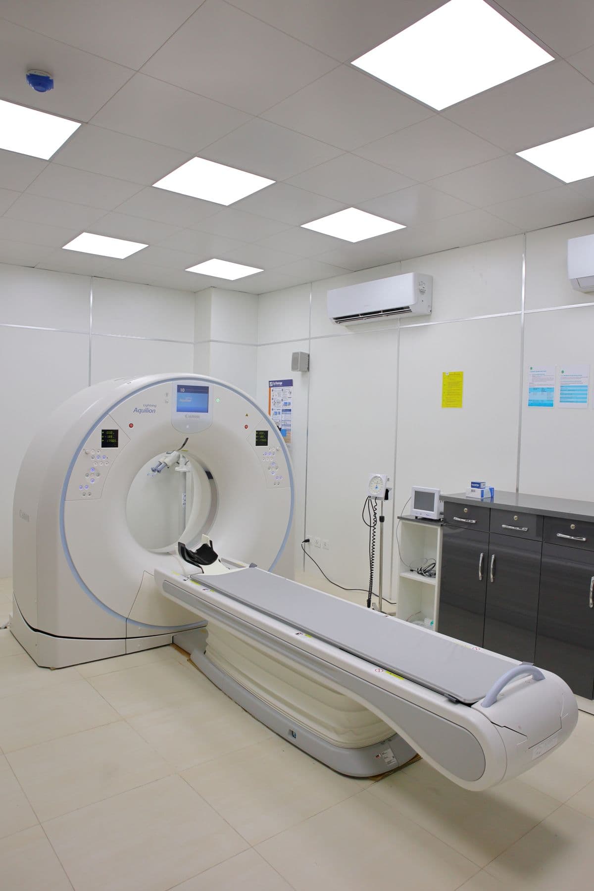 Multi-slice CT scanner with patient table in a clean diagnostic imaging room