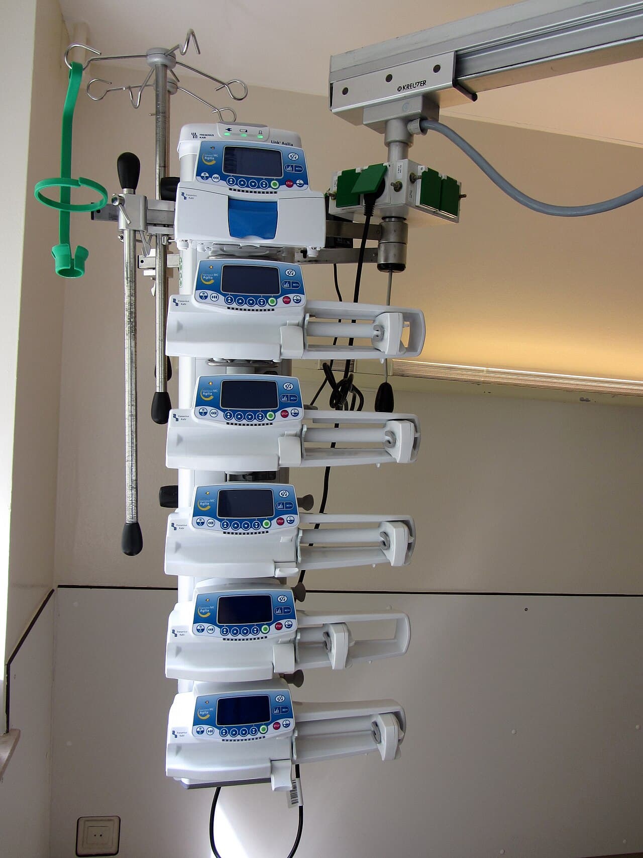 Stack of syringe driver infusion pumps mounted on an IV pole